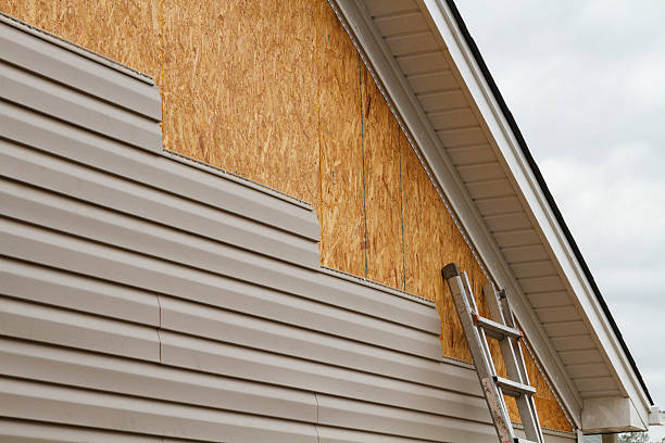 Professional Fiber Cement Siding technician working in Ridge, NY
